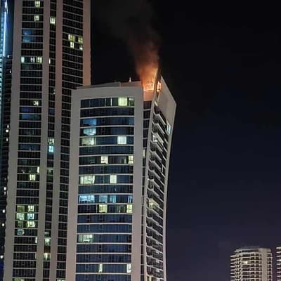 Hundreds evacuated as tourist hotel roof catches fire