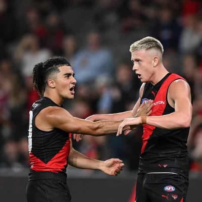 Bombers burst past Power for first win of AFL season