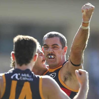 Walker slots four goals as Crows down Kangaroos