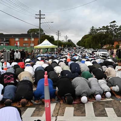 Muslims mark Eid 'tinged with sadness and joy'