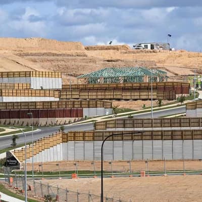 Brick by brick, parties build election housing pitches