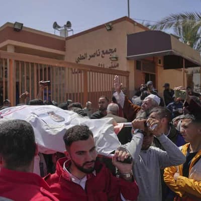 Palestinian medics' bodies recovered from grave in Gaza