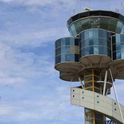 Passenger charged over alleged mid-air exit door scare