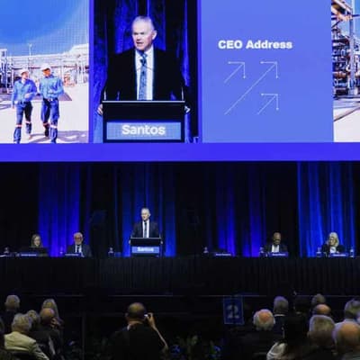 Oil-gas giant defends energy policy, share-price slide