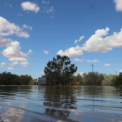 Flood-stricken town pledges survival as locals unite