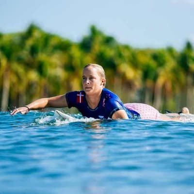 Aussie surfer storms into semi on twin's wedding day