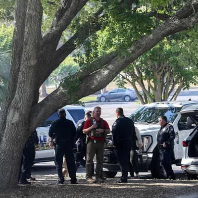 Deputy sheriff's son shoots two dead at US university