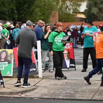 Eager voters ditch tradition, hit the ballot box early