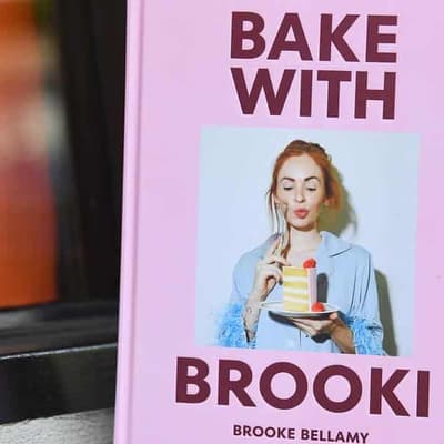 Viral baker maintains innocence amid author food fight