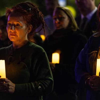 Victims of violence honoured in candlelight vigils