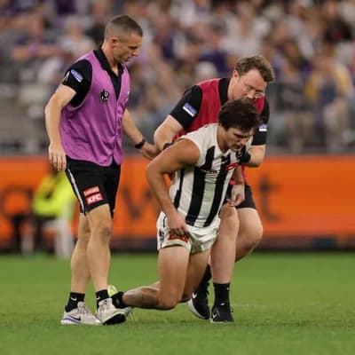 Umpires didn't notice concussed Magpie Schultz: AFL