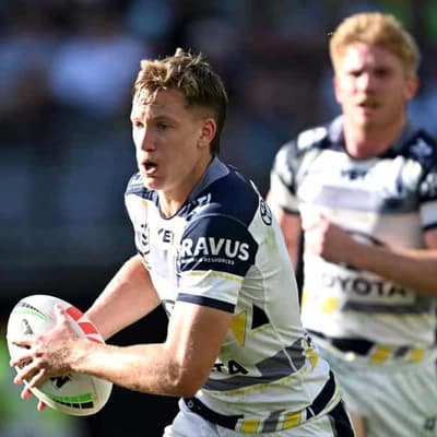 Cowboys axe halfback to take chance on gun teen