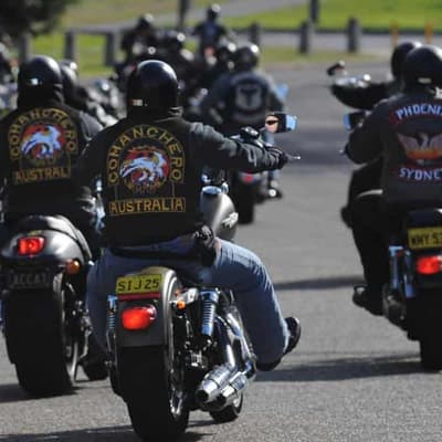 Bikie dropped off at hospital after being shot, burnt