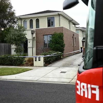 Mum fights for life as police continue house fire probe