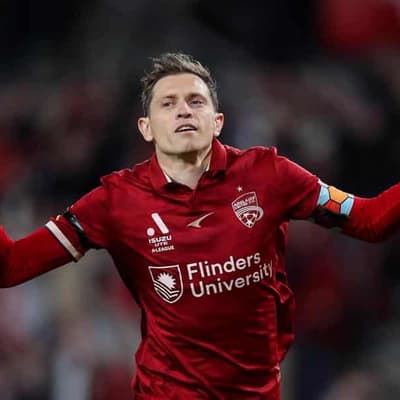 'Unfinished business': Socceroos star seals Reds return
