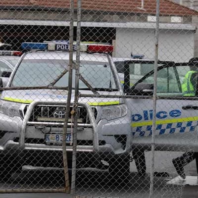 CCTV clues after body found in bin at shopping strip
