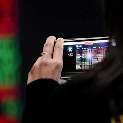 Australian shares retreat from highs for second time