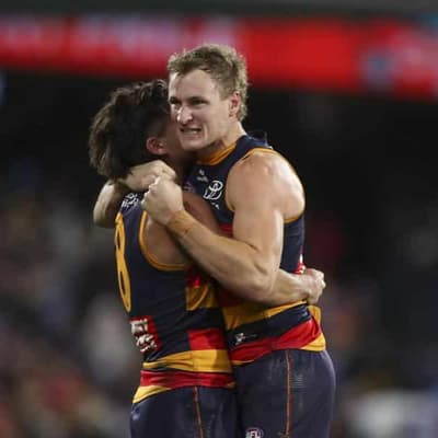 Comeback Crows' late surge sinks Brisbane in thriller