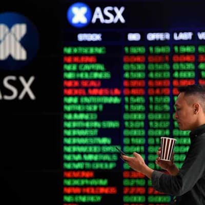 Australian shares hit record close as bank stocks surge