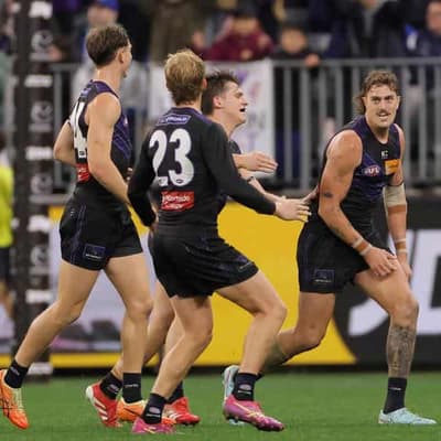 Freo survive major scare as Roos comeback falls short