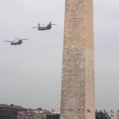 Trump's military parade rolls by on day of protests