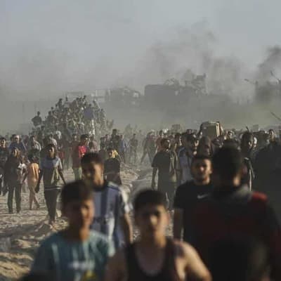 Israeli tanks kill 59 in Gaza trying to get aid: medics