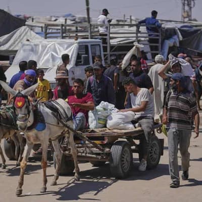 New Gaza talks push as Israeli attacks kill at least 21