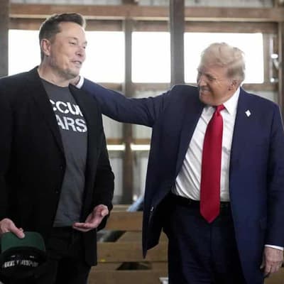 Trump escalates Musk feud with threat to Tesla support