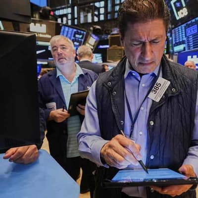 Tech stocks boost Nasdaq, S&P 500 to record highs