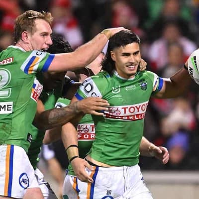 Hat-trick hero helps Raiders pip Dragons, top NRL table