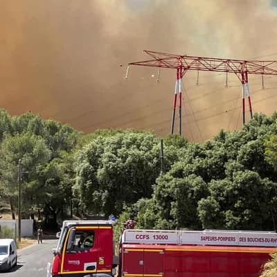 France, Spain feel the heat as wildfires threaten homes