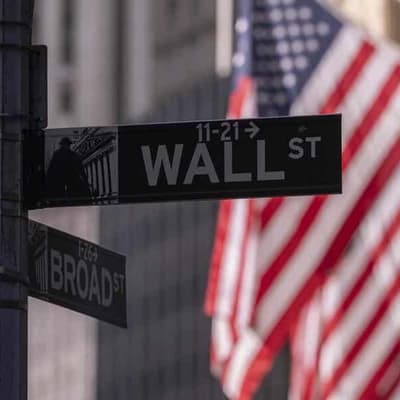 Wall St edges lower as investors await tariff clarity
