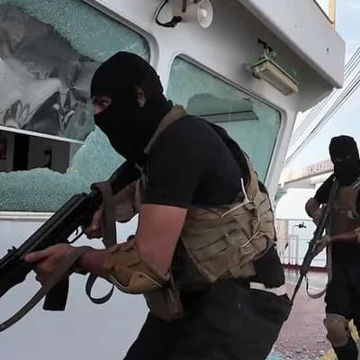 Search for survivors after attack on ship in Red Sea