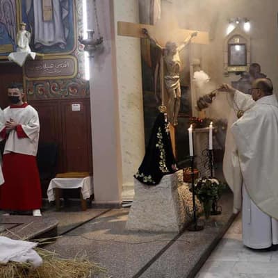 Two die in church as Israeli strikes kill 22 in Gaza