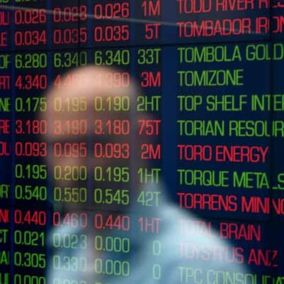 Australian shares gain as miners rise, banks fall