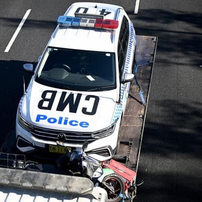 Cop car in multi-car motorway crash, scooter rider dead