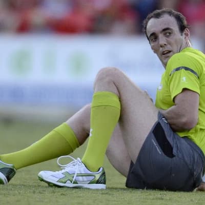 Ex-AFL umpire evaded police in 'panic' due to warrant
