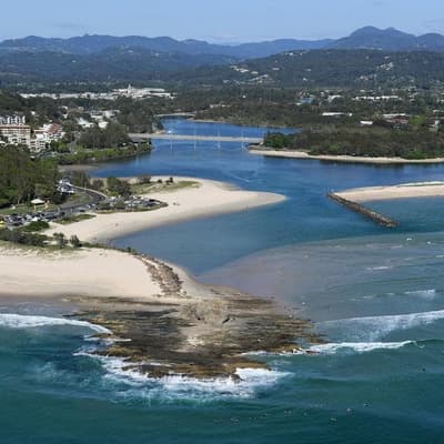 Body in creek fourth grim discovery on glitter strip