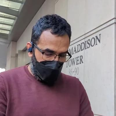 Doctor masks up as talks continue on sex abuse charges