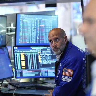 Wall St ends mixed as Fed dampens September cut hopes