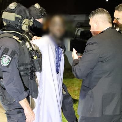 Laughs, dancing as men deny roles in underworld hit