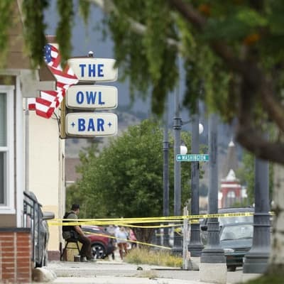 Police hunt ex-soldier after four shot dead in US bar