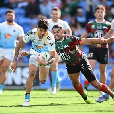 Mitchell stars on return as Souths hold out Titans