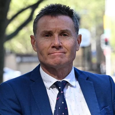 Former MP's win against $40,000 fine for Facebook posts