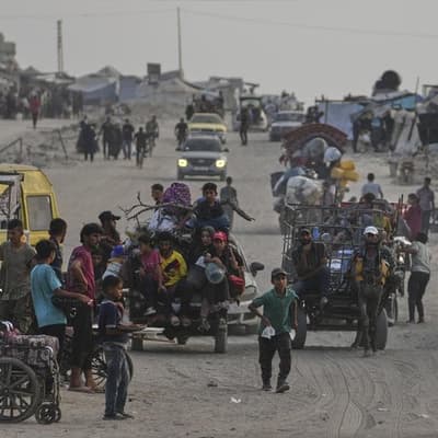 Hamas at talks, while Israel says Gazans free to exit