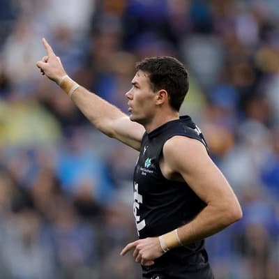 Voss behind McGovern, excited for Walsh's Blues return