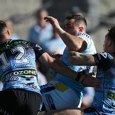 Captain's injury only sour note as Sharks smash Titans