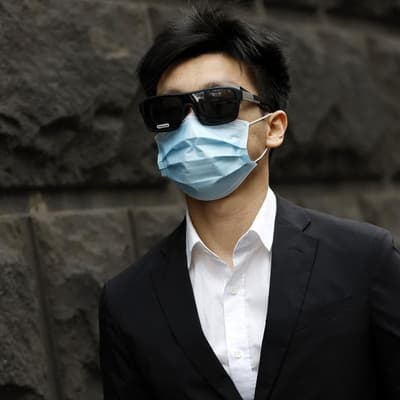 Doctor accused of filming in toilets walks from court