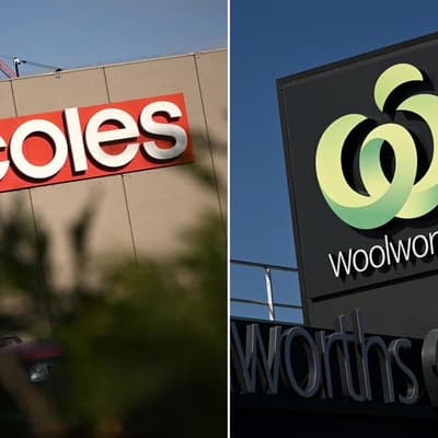 Shoppers check out of Woolies as Coles registers gains