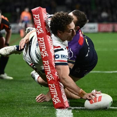 Roosters storm home, leave their Mark in Melbourne